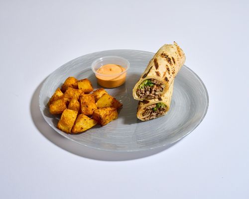 Spicy Beef Wrap - Beef, Lettuce, Jalapeno, Green pepper, Low fat white cheese, spicy sauce.  Calories 463 , Protein 31g , Carb 42g , Fat 19g .