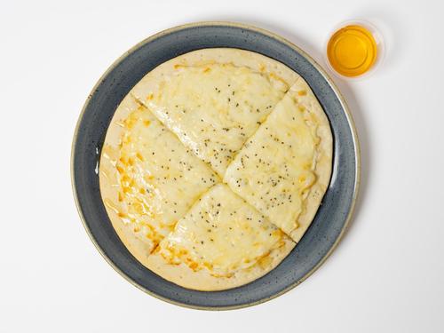 Sukarya - dough 10 insh , Cream Cheese Light , Light mozzarella cheese , honey . Calories 731 , Protein 41.4 , Carb 71.5 g, Fat 31 g .