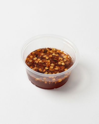 Hot honey sauce (20 g) - Calories 64 , Protein 0g , Carb 16g , Fat 0g.