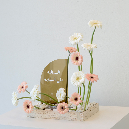 Raya - Travertine tray that contains: Acrylic stand (customize name) كتابة الاسم في الصندوق ادنى الشاشة » Fresh flowers  Roots chocolate width 30 cm  height 45 cm