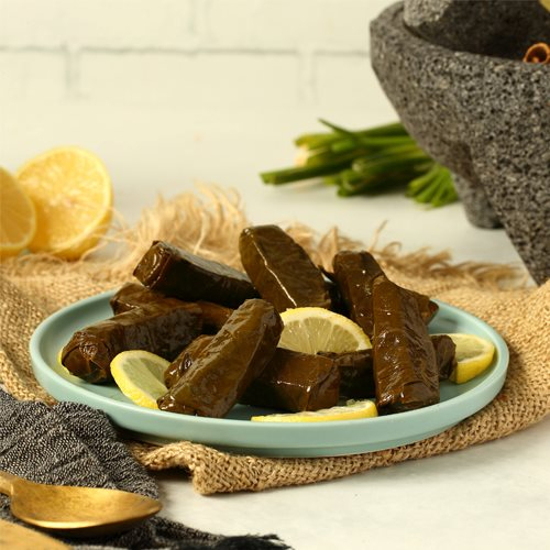 Sour Vine Leaves - vine leaves stuffed with herbs ,rice with olive oil & lemon dressing