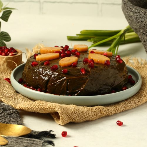 Vine Leaves Cake Pomegranate - Vine leaves Cake stuffe with herbs & rice , pomegrenate dressing