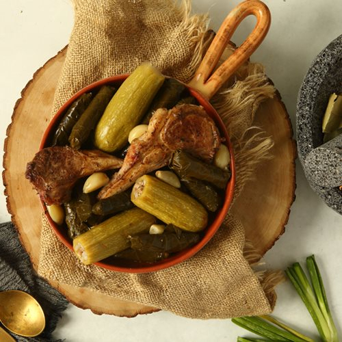 Stuffed zucchini , Vine Leaves with Lamb Chops - Vine leaves  & stuffed zucchini with lamb chops