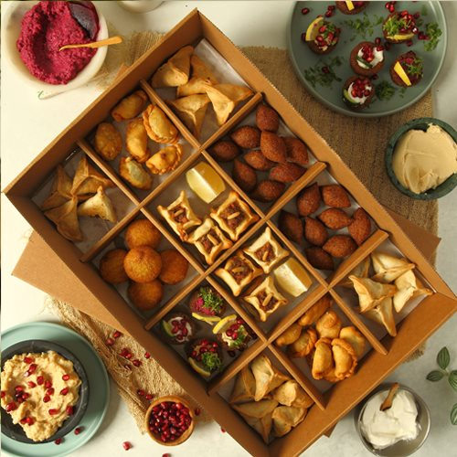 The Minis Box - mix of 9  mini dozens of spinach fatayer, wild zaatar, sfiha,kibbeh, kibbeh cups , potato chop,cheese & meat sambousek