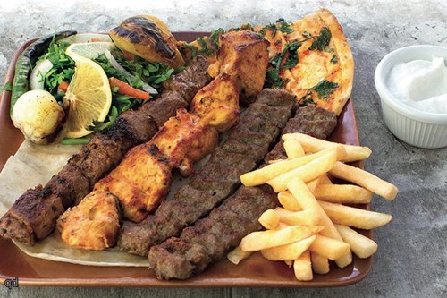 Mixed Grill plate - mixed grill of 4 skewers : 2 kabab , 1 tekka , 1 shish tawook