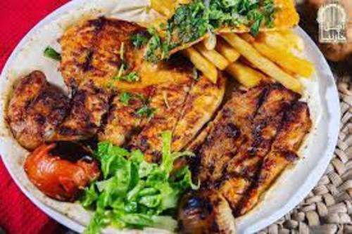 Grilled chicken - charcoal Grilled chicken served with french fries