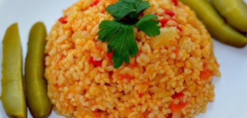 Burghol with tomato - Crushed Burghol with diced onion  tomatoes cooked with olive oil