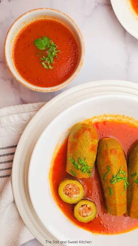 Stuffed zucchini with red sauce - Stuffed Zucchini with meat & rice cooked with tomato sauce