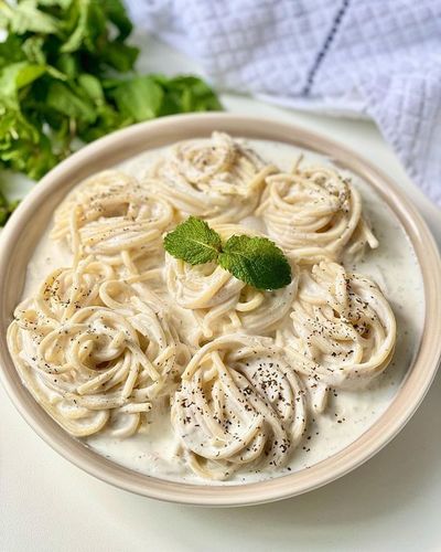 maccaroni b labban (yogurt) - boiled spaghetti  , in yogurt with dry mint &  minced garlic