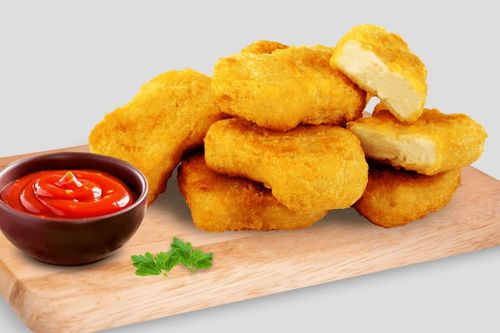 Chicken Nuggets - 6 pcs of Nuggets served with ketchup