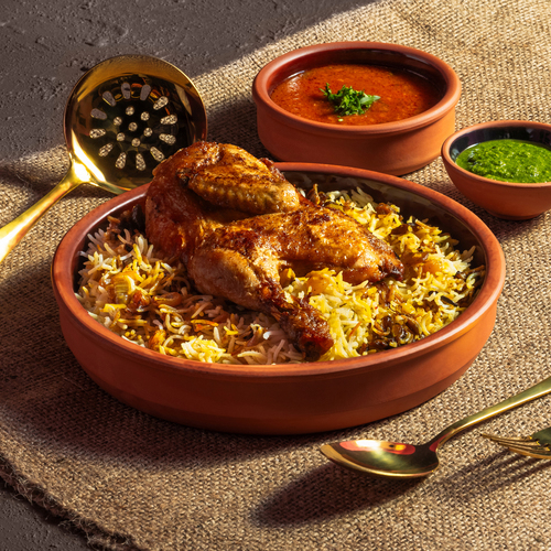 Lokmat Beit - Chicken Machbous - Machbous Rice served with half chicken & dakous