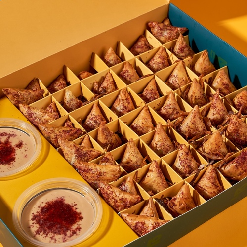 muskhan sambosa crispy - Mini Musakhan Samosa stuffed with our delicious crispy mix, served with two special sauces: pomegranate molasses and our signature tahini sauce