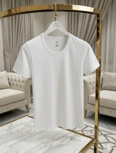 Men’s Round Neck T-shirt - 100% Cotton Undershirt&nbsp;Experience true softness with this Al-Ashhab undershirt, made from 100% natural cotton. Designed to be gentle on your skin, it keeps you feeling fresh and dry all day long thanks to its breathable fabric. • Material: High-quality 100% cotton. • Color: White • Sizes: Available from S to 3XL.