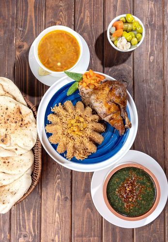 ربع بط مع ارز بالخلطة - ربع بطة مع ارز بالخلطة وملوخية وشوربة لسان عصفور مع الخبز والمخلل