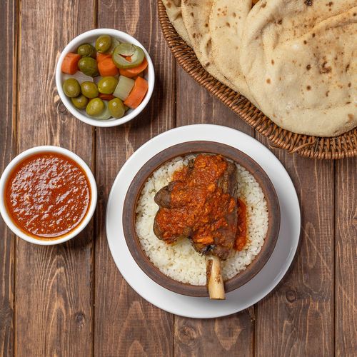 MOUZA FATA - Lamb shank with breaded and white rice with special tabliya sauce