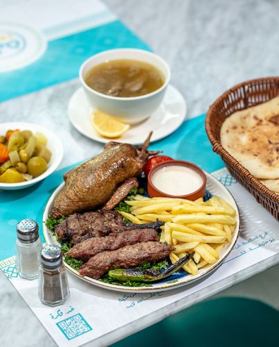 Prince Meal - 1 pcs Pigeon Grits or Rice 1 pcs Lamb Chops 1 Kofta 1 Pigeon Soup with Fries Tahina and Mixed Pickles