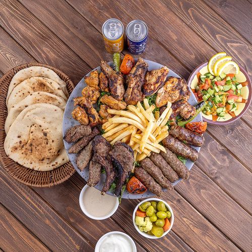 Friends Tray - 2 lamb chops,2 tarp,2 kabab,2 kofta,2 tawooq,half grilled chicken with salad, Tahina, garlic,bread and soft drinks