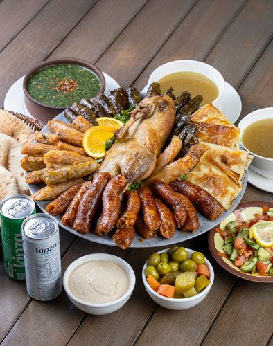 Half Funny Duck - Half Duck- 15 cabbage- 15 Vine Leaves- sml Mombar- 1 Goulash- 1 Molokhia- 2 pigeon Soup- salad-Tahina- Mixed Pickles- 2 Kinza- 2Bread