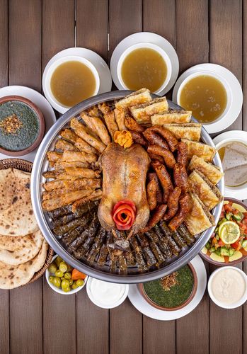 Funny Duck Meal - Whole Roasted Duck-Lrg Cabbage-Lrg Vine Leaves-Lrg Mombar-2 Goulash-2Molokhia-4 Pigeon Soup-Salad-Tahina-Mixed Pickles-4Kinza-4 Bread