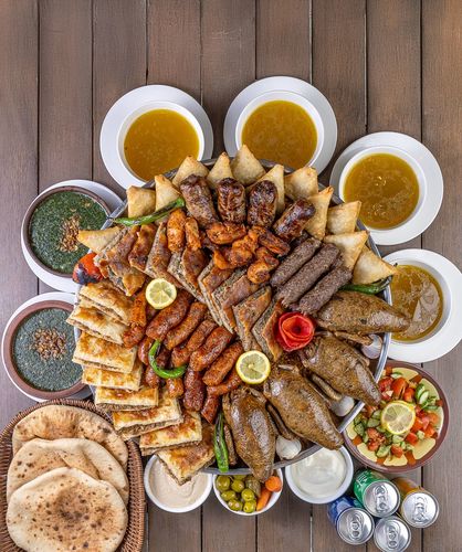 Al Atawlah - 4 PIGEON - 3 KOFTA-3TAWOUK- 2 HAWAWSHI-1 LRG MOMBAR-4 TARB-2 GOULASH-12 SAMBOSA-2 MOLOKHIA -4 PIGEON SOUP- SPICES RICE-1 SALAD-1 TAHINI -1 GARLIC-1 MIXED PICKLES-4 BREAD-4 KINZA-