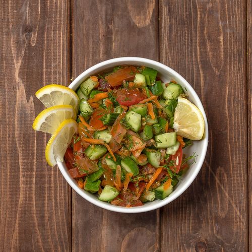 Green Salad - Egyptian green salad consisting of a rich and refreshing mix of Fresh Vegetables with special spices.