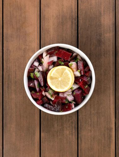 Beetroot with Onion salad - carefully boiled beets are added to a mixture of Onion, Spices and Olive Oil to add a Rich and Beneficial Taste.