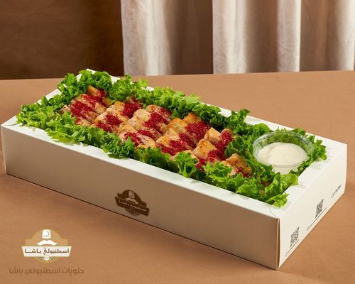 مسخن - Tender chicken marinated in a blend of spices, caramelized onions, and fragrant bread