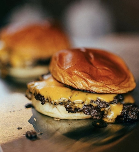 The S-Burger - single angus beef patty , American cheese ,white onion ,sold out special sauce