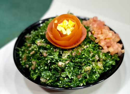 Tabbouleh - Consisting of parsley, fine bulgur and tomatoes with olive oil and lemon juice