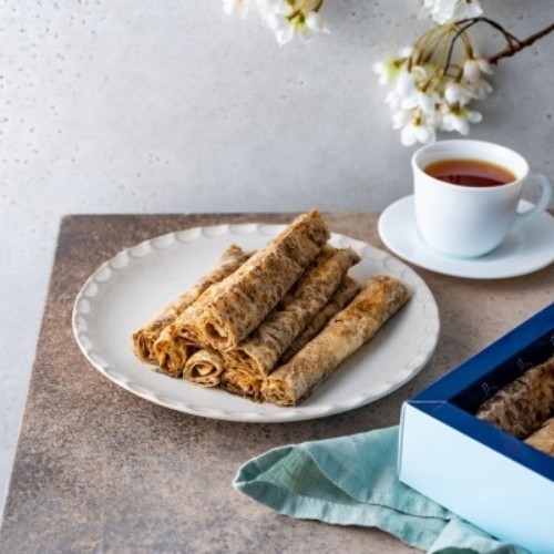 Zaatar with Pomegranate molasses - Saj roll - Regular - A box contains 32 pieces of regular-size saj roll filled with zaatar and pomegranate molasses.