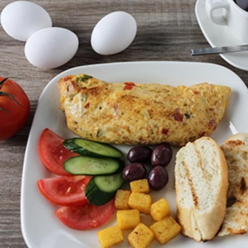 Mixed Omelette with Cheese - Sautee mixed bell pepper fresh onion & tomato, cheddar cheese.