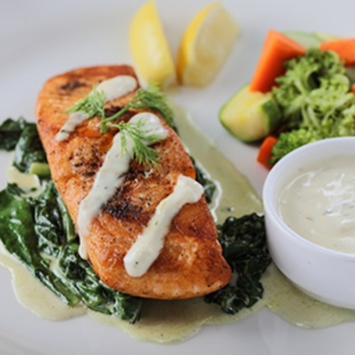 Grilled Salmon - 200g Grilled salmon, rocca, steam veg, broccoli, carrots served with lemon butter sauce.