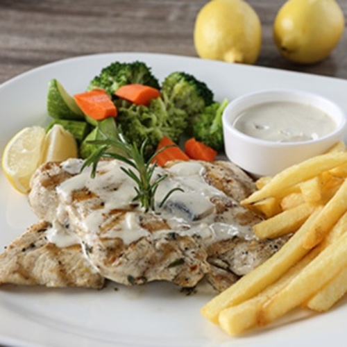 Grilled Chicken Breast - Grilled chicken breast served with fries & vegetables .