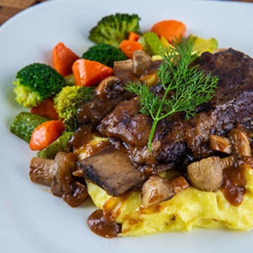 Short Ribs - Grilled ribs, mashed potato, mix vegetables, mushroom served with marination ribs sauce.