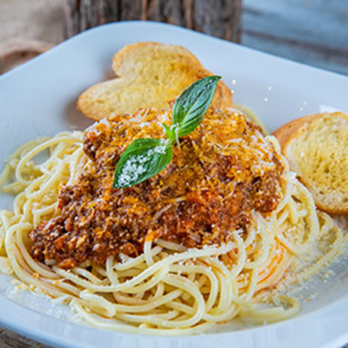 Spaghetti Bolognese - Spaghetti pasta with traditional meat sauce, diced with carrots and celery fresh oregano.