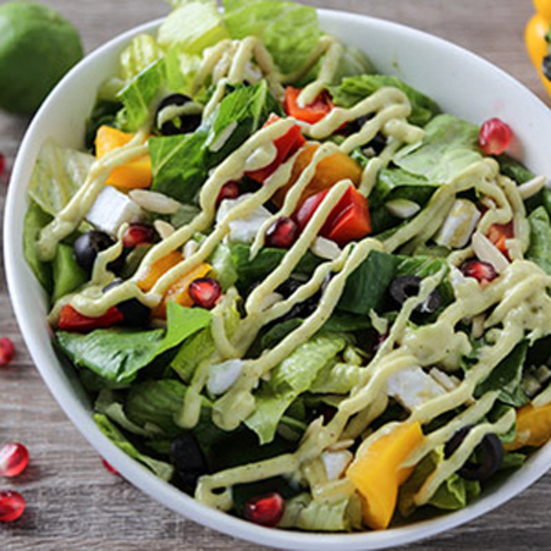 Greek Salad - Fresh romaine lettuce, tomato, black olive, mixed capsicum, onion, cucumber,chopped almonds, homemade sauce & feta cheese.