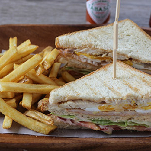 Authentic Zephora Club - Grilled chicken breast, sliced of turkey, egg,  lettuce, tomato, avocado, cheddar cheese, french fries & our special zephora sauce.