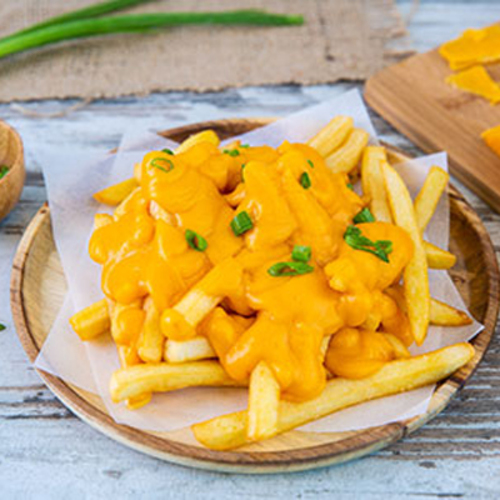 Creamy Cheese Fries - Fries served with creamy cheddar cheese on top.