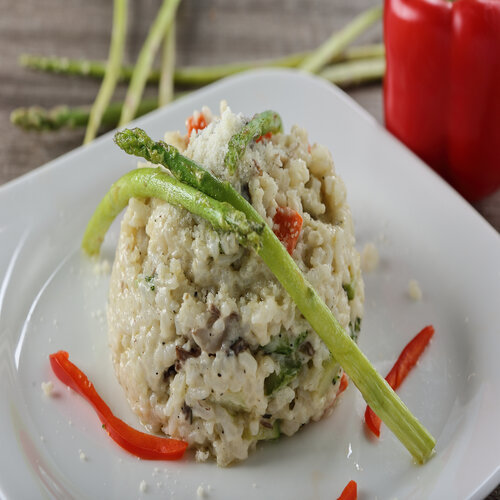 Risoto - Italian Rice with fresh vegetable, mushroom, carrots, zucchini.