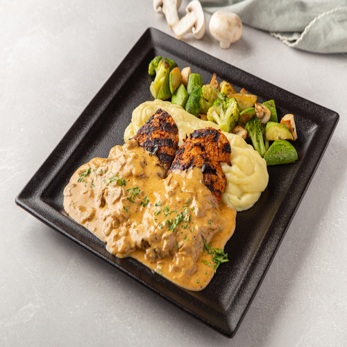 Cajun Chicken - Grilled cajun chicken with spicy cajun mushroom sauce served with mashed potato & sauté  vegetables