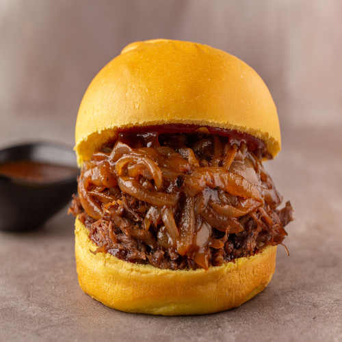 Ribs Burger - Pulled short ribs with caramelized onions , served with BBQ sauce