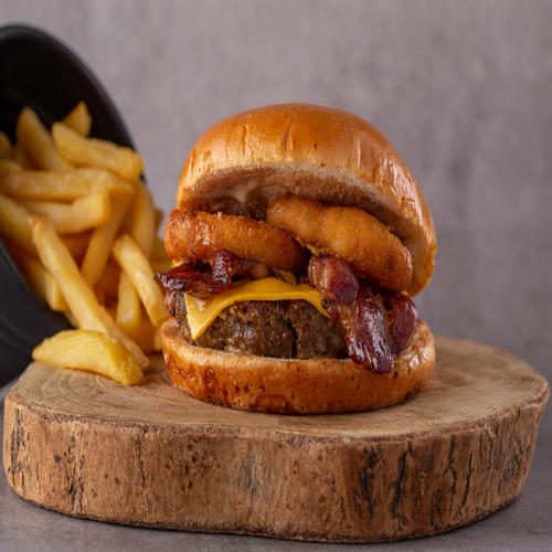 Smoked Burger - Grilled angus beef & bacon, fresh onion ring, serve with creamy cheddar cheese with smoke sauce.