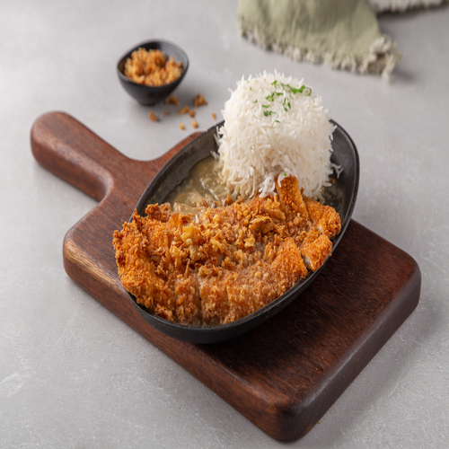 Sizzling fried chicken - Tender bradded chicken with special gravy sauce, crispy onion on top , served with rice