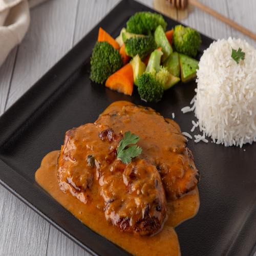 Honey chicken - 2 piece of grilled chicken with homemade honey sauce , served with rice & sauté vegetables.