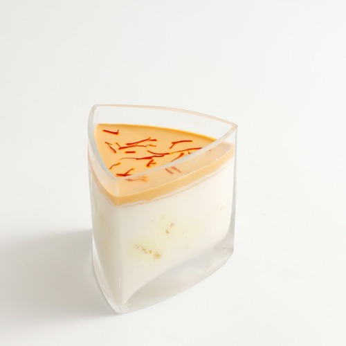 قرص عقيلي - طبقات من الكيك الخفيف والكريمة مع قرص العقيلي