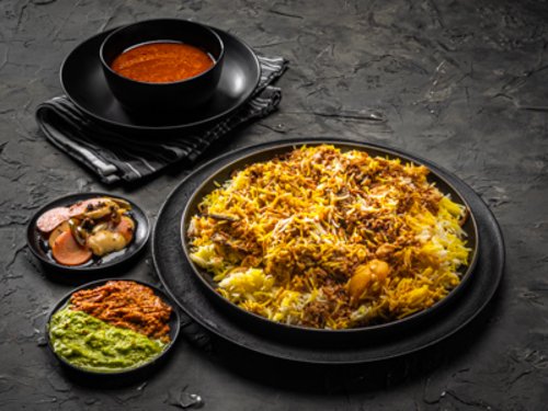 Chicken Biryani - Served with kuwaiti daqoos, maabouj, traditional agar and Lemon With Khass