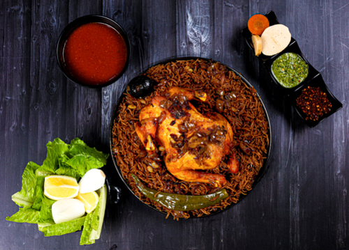 Mahmous Chicken Raee  Al Awelah ( Sayadiya ) - A whole Chicken Weighing 600 grams  Served  Mahmous ( Sayadiya) Rice and Kuwaiti Ajar and Red.green Maabooj