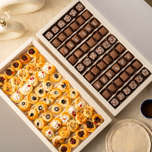 Copz Offers - عرض عبارة عن بوكس كاكاو ٥٤ قطعه كاكاو بحشوات مختلفة برلين بندق ، بستاشيو ، فول سوداني سنيكرز،كندرمع بوكس ميني فطاير ٤٥ قطعه  سبيشل بحشوات مختلفة ، جبن فيتا ، باذنجان ، زهره مع بطاط ، لبنة رمان ، بيتزا