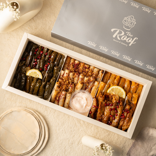 Mix preheated wrapped grape leaves - Mualq Box Mix, Pomegranate grape leaves, heated lemon, crispy chicken, pomegranate cabb, lemon, 75 pieces