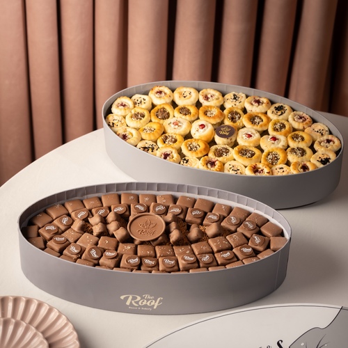 The Roof 9  Boxes Offers - عرض عبارة عن صينية كاكاو ٨٠ حبة بحشوات مختلقة عرض عبارة عن بوكسات ذا روف بتصميم خاص مع ١٤٦ قطعة كاكاو بحشوات مختلفة سناك سولتي ، كورفلكس كاكاو كرانشي ، بستاشيو ، برلين مع بوكس ميني فطاير ٤٨ قطعة بحشوات مختلفةلبنة زعتر ، خلطة الحلوم ، خلطة جبن فيتا مع المكسرات ، خلطة اللبنة بالذره ، زعتر بالسمسم،